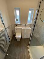 Storey Apartment - 2 Bedroom Upstairs Flat