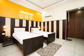 Fabhotel Tanvi Premium