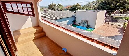 Casa com Piscina e Churrasqueira