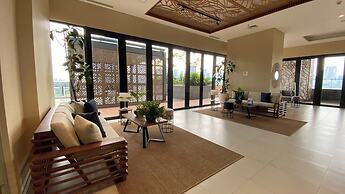 Modern and New 1BR across LRT Station Samara Suites Apartment