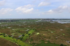 Comfy Studio Room At Osaka Riverview Pik 2 Apartment