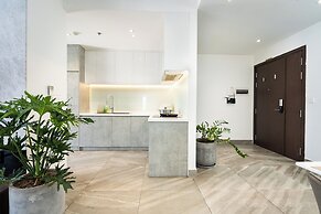 REM Rivergate Garden Pool Signature Apartments