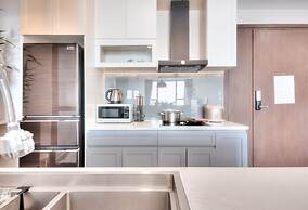 REM Rivergate Garden Pool Signature Apartments