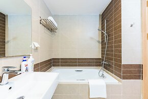 REM Rivergate Garden Pool Signature Apartments