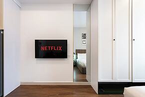 REM Rivergate Garden Pool Signature Apartments