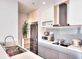 REM Rivergate Garden Pool Signature Apartments