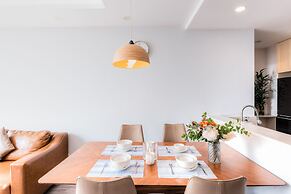 REM Rivergate Garden Pool Signature Apartments