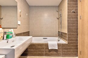 REM Rivergate Garden Pool Signature Apartments