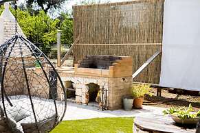 Trullo Nonna Netta con Piscina Idromassaggio e Area Giochi