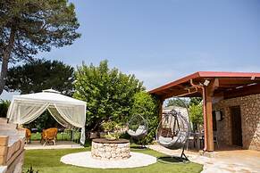 Trullo Nonna Netta con Piscina Idromassaggio e Area Giochi