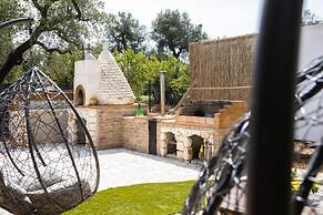 Trullo Nonna Netta con Piscina Idromassaggio e Area Giochi