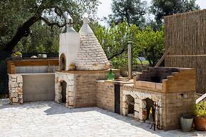 Trullo Nonna Netta con Piscina Idromassaggio e Area Giochi
