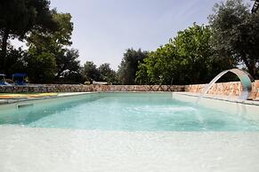 Trullo Nonna Netta con Piscina Idromassaggio e Area Giochi