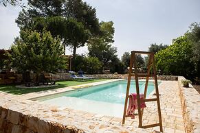 Trullo Nonna Netta con Piscina Idromassaggio e Area Giochi