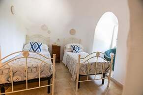 Trullo Nonna Netta con Piscina Idromassaggio e Area Giochi