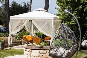 Trullo Nonna Netta con Piscina Idromassaggio e Area Giochi