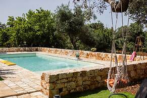 Trullo Nonna Netta con Piscina Idromassaggio e Area Giochi