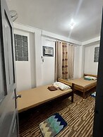 Lao Singuan Homestay powered by Cocotel