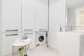 Minimalist Apartment Poznan by Renteres