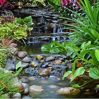 Rich Garden House Hotel