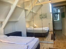 Holiday Home - 8 Persons - With Sauna at the Lauwerslake Near Wadden S