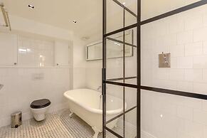Sleek & Stylish 2BD Flat - Warren Street