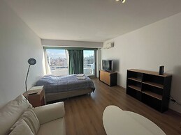 Studio Apartment on 13th Floor Above 9 de Julio Avenue
