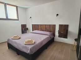 Suite Apartments i4MORI Porto Pino