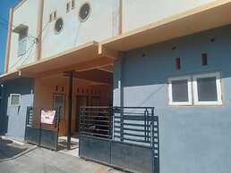 SPOT ON 92730 Lili Kost SyariahNearKetapang Royal City