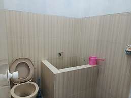 SPOT ON 92730 Lili Kost SyariahNearKetapang Royal City