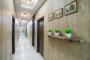 Fabhotel Dps International