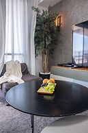 Stylish 1BR Beach-Front Apt w Sea View