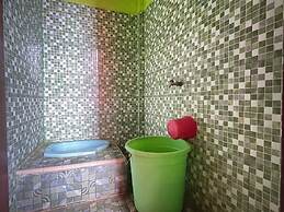 SPOT ON 92766 Penginapan Asoka Indah Near PT. PLN (persero) Gardu Indu