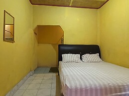 SPOT ON 92766 Penginapan Asoka Indah Near PT. PLN (persero) Gardu Indu