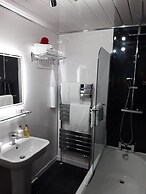 Cadillac Kustomz Guest House