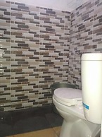 EXPRESS O 92070 Mando Homestay Syariah Near KANTOR LURAH Bukik Apik Pu