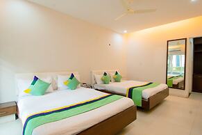 Treebo Midvalley Residence