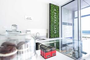 S Plaza Suites Hotel