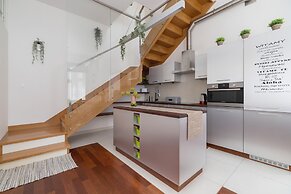 Krakow Two-storey Apartment by Renters