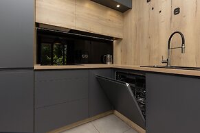 Modern Zoliborz Apartment by Renters