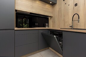 Modern Zoliborz Apartment by Renters