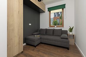 Modern Zoliborz Apartment by Renters
