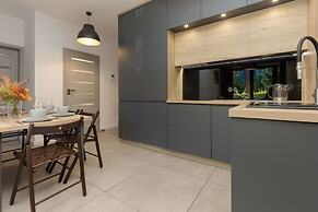 Modern Zoliborz Apartment by Renters