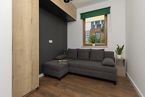 Modern Zoliborz Apartment by Renters