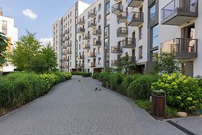 Modern Zoliborz Apartment by Renters
