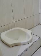 SPOT ON 91797 Mutiara Guest House