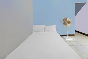 SPOT ON 92507 Sukandi Homestay Near The Semeton Homestay