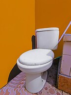 SPOT ON 92507 Sukandi Homestay Near The Semeton Homestay