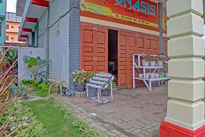 SPOT ON 91966 Onasis Syariah Inn