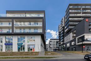 Studio Near Manufaktura Łódź by Renters